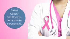 Doctor wearing a breast cancer ribbon