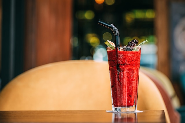 A full glass of a healthy red juice